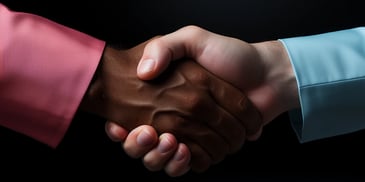 a close-up of hands shaking