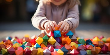 a child playing with colorful blocks