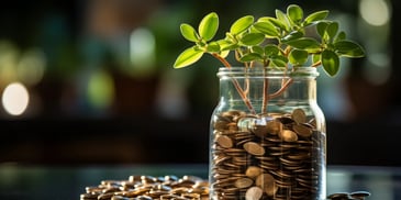 a jar full of coins and a plant