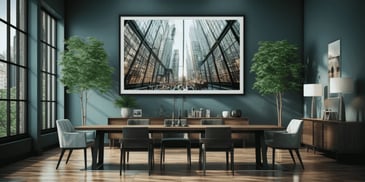 a dining room with a table and chairs and a framed picture on the wall