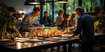 a group of people looking at a plant in a glass case