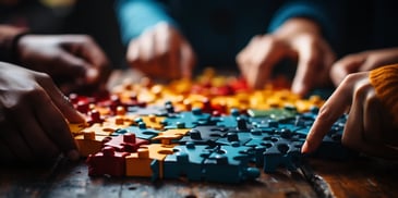 a close up of a hands working on a puzzle