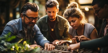 a group of people looking at small cups