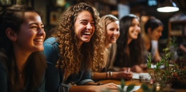 a group of women smiling