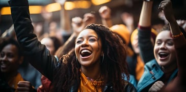 a group of people cheering cheering